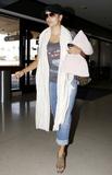 th_51627_Preppie_-_Eva_Longoria_departing_from_LAX_Airport_-_August_6_2009_032_122_353lo.jpg